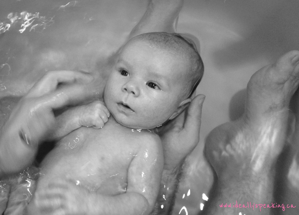 First bath in the big tub with Dad. Also the first bath without tears...